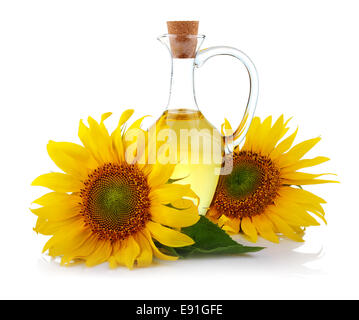 Jug of sunflower oil with flowers isolated Stock Photo