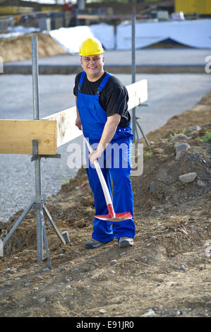 Craftsman with a shovel Stock Photo