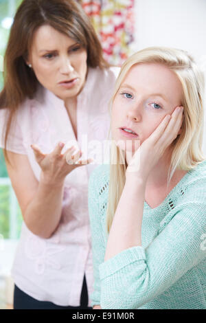 Mother Arguing With Teenage Daughter Stock Photo