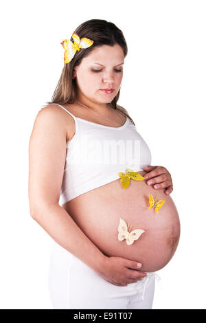 Pretty pregnant woman with butterflies Stock Photo