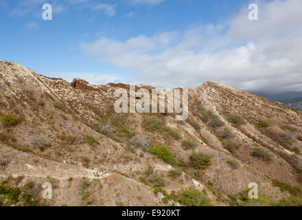 Tourists walking to top of Waikiki crater Stock Photo