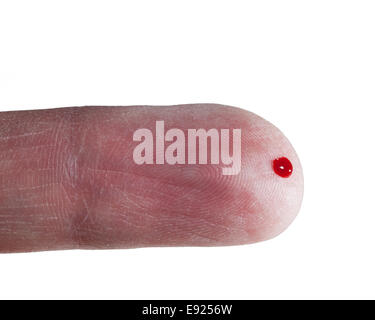 Drop of blood on finger of male Stock Photo