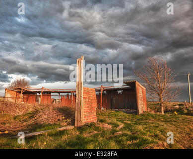 Deserted barn in storm Stock Photo