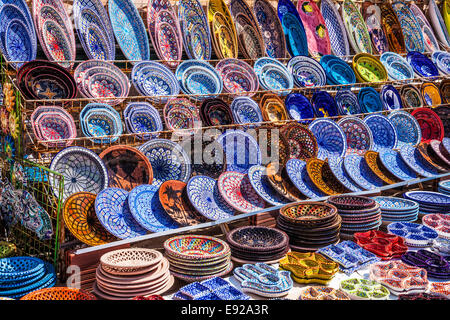 Souvenir Tunisian ceramics displayed outside a shop in Port el Kantoui in Tunisia. Stock Photo