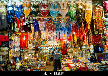 Belly dancer dress and souvenirs at the Misir Carsisi (Egyptian bazaar). Istanbul. Turkey. Stock Photo
