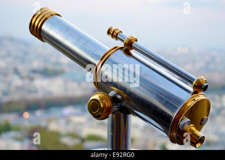 Telescope on the Eiffel Tower Stock Photo