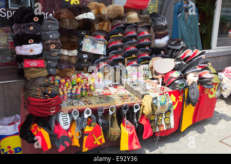 Sale stand of Soviet and DDR militaria near Checkpoint Charlie in Berlin, Germany. Stock Photo