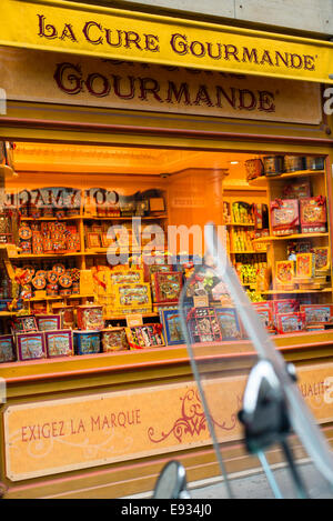 Storefront of La Cure Gourmande confectioneries shop on Rue de Rivoli, Paris, France Stock Photo