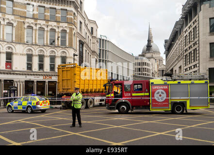London, UK. 17th October, 2014. Road accident involving a dumpster lorry and cyclist at Ludgate Circus London UK 17/10/2014 Credit:  Martyn Goddard/Alamy Live News Stock Photo