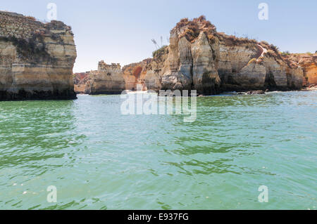 Rock formations near Lagos in Portugal seen from the water. Stock Photo