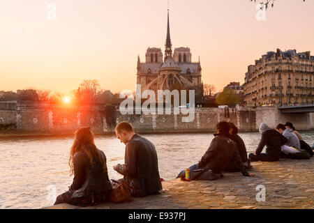 People relaxing along the seine river Stock Photo