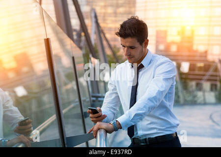 Portrait of Businessman using smart phone Stock Photo