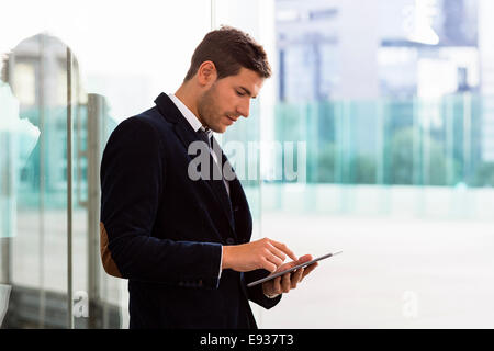 Businessman using Digital Tablet Stock Photo