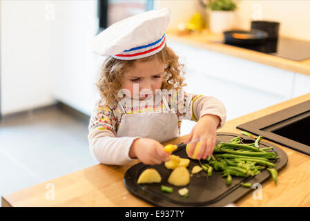 Portrait of little chef cooking Stock Photo