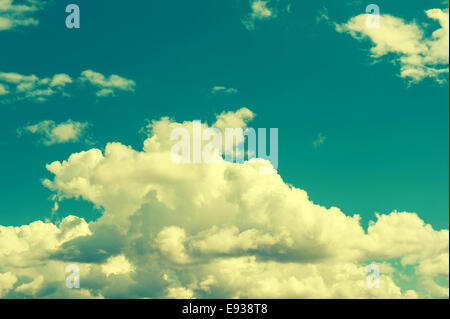 turquoise blue cloudy sky background. vintage style toned picture Stock Photo