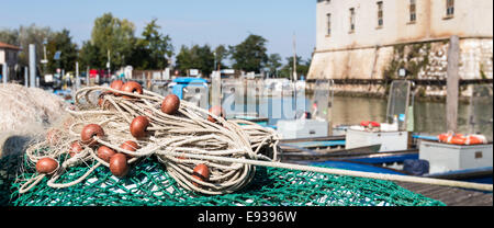 Fishing Net with attached cork floats, ca. 1945 - Maine Memory Network