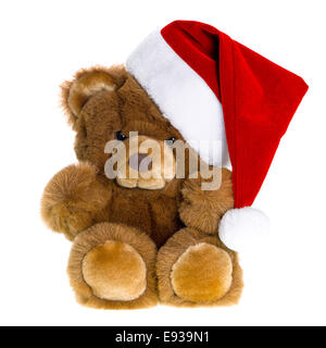cute vintage teddy bear with red santa hat. christmas decoration Stock Photo