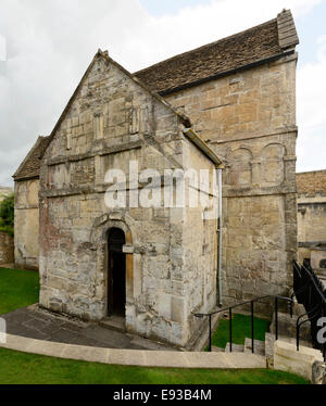 side of Saxon church of st Lawrence, side view of ancient  Saxon stone church in small village on river Avon Stock Photo