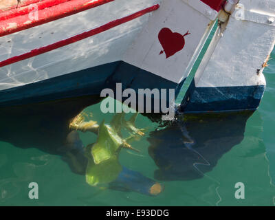 Fishing boat detail in the harbour of Pythagoerion, Samos island Greece. Summer, sun, colours water and love Stock Photo