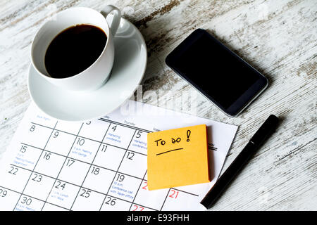 Checking monthly activities and appointments at the office Stock Photo