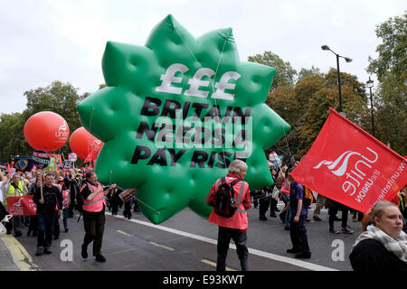 London, UK. 18th Oct, 2014. Thousands of workers march and rallly in central London for Britain needs a pay rise, demanding better wages and an end to zero hours contracts. Credit: Yanice Idir / Alamy Live News Stock Photo
