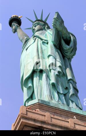 Looking up at the Statue of liberty, New York City, USA Stock Photo