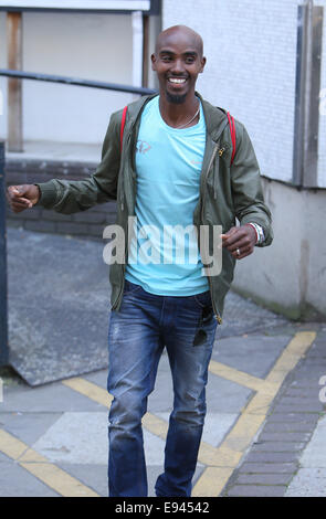 Mo Farah and his wife Tania outside the ITV studios  Featuring: Mo Farah Where: London, United Kingdom When: 16 Apr 2014 Stock Photo