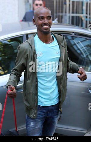 Mo Farah and his wife Tania outside the ITV studios  Featuring: Mo Farah Where: London, United Kingdom When: 16 Apr 2014 Stock Photo