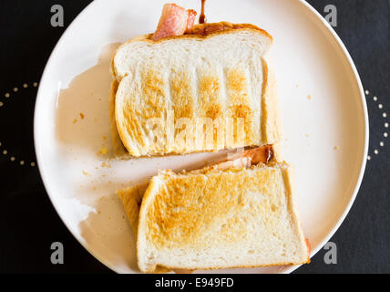 A toasted bacon sandwich Stock Photo