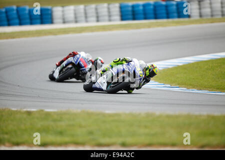 Phillip Island, Australia. 19th Oct, 2014. Valentino Rossi on bike number 46 on his way to vicory in the motoGP class after passing Jorge Lorenzo on bike 99 at 2014 Tissot Australian Motorcycle Grand Prix Credit:  Jandrie Lombard/Alamy Live News Stock Photo