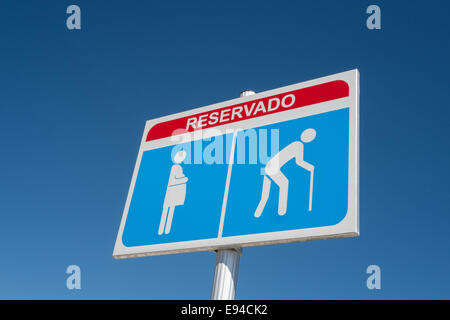 Reserved Parking Signs for Pregnant and Disabled Stock Photo