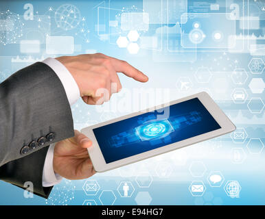 Man hands using tablet pc. Image of business elements on screen Stock Photo