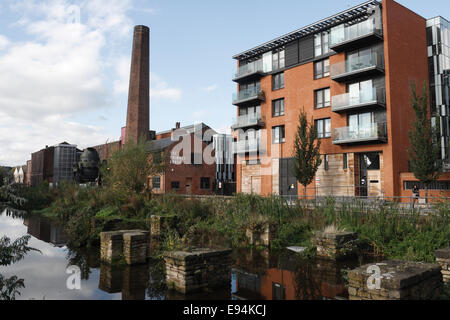 Kelham Island Apartments in Sheffield England UK, Urban redevelopment, Inner city residential apartments preserved industrial chimney Stock Photo