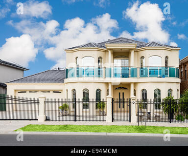 facade of a luxury modern suburban house at noon Stock Photo