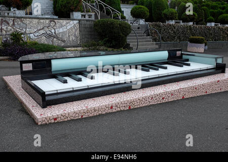 Giant Piano at grave of Teresa Teng at Chin Pao San, a cemetery in Jinshan, New Taipei City, Taiwan Stock Photo