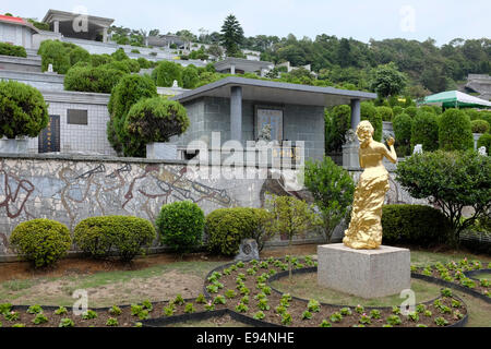 Rear view of golden Teresa Teng statue which is at her grave at Chin Pao Shan, Jinshan, New Taipei City, Taiwan Stock Photo