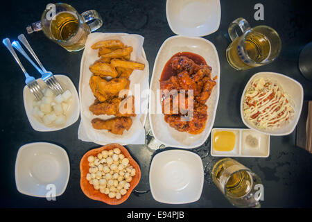 September 10, 2013, Seoul, South Korea - Korea - A typical meal of fried chicken, Korean coleslaw. Stock Photo