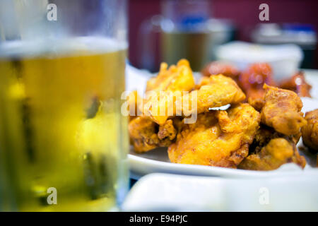 September 10, 2013, Seoul, South Korea - Korea - A typical meal of fried chicken accompanied with beer at Chung Ghi Wa Stock Photo