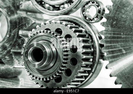 cogwheels and gears, engineering parts in titanium Stock Photo