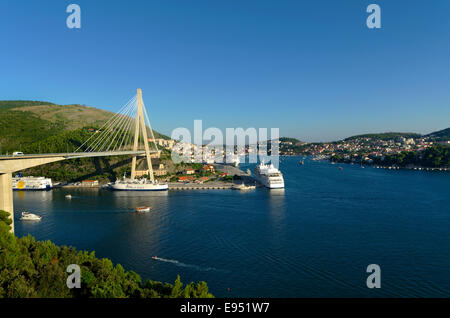 Cruise ships and Gruz harbour at Dubrovnik in Croatia showing bridge carrying the North to South highway over the river Ombla, Stock Photo