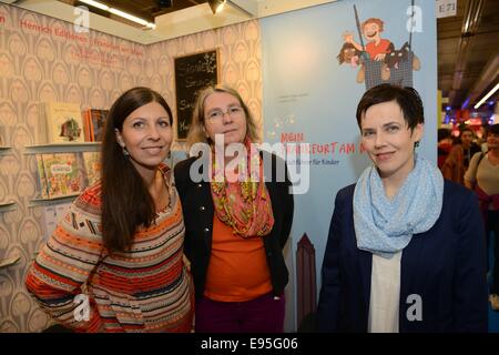 l-r.: Verlegerin Cristina Henrich-Kalveram, die Autorinnen Lenonore Poth und Bettina Tenge-Lyazami , at the 66th Frankfurt Book Fair in Frankfurt Main, Germany, October 2014. Stock Photo