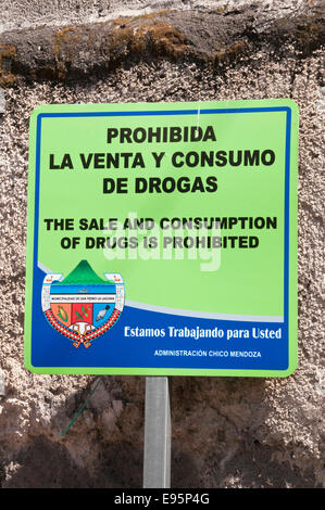 The Sale and Consumption of Drugs is Prohibited, sign in Spanish, San Pedro La Laguna, Lake Atitlan, Guatemala Stock Photo