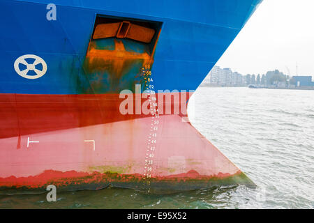 Large ship with draft scale and anchor on the bow Stock Photo