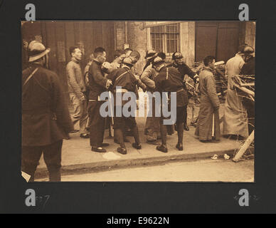 Black and white photograph of Chinese soldiers lined up