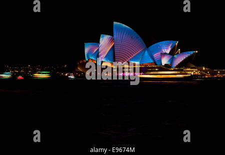 Sydney Opera House lit up with colourful lights during Vivid Night Festival Stock Photo