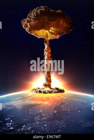 Detonation of a nuclear bomb with a mushroom cloud Stock Photo