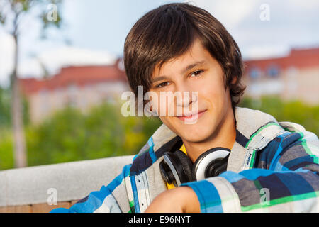 Close up view of boy wearing headphones Stock Photo