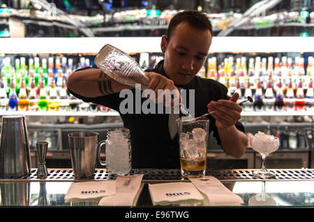 Bartender making cocktails at The House of Bols, Cocktail & Genever Experience on the Museumplein square in Amsterdam Holland Ne Stock Photo