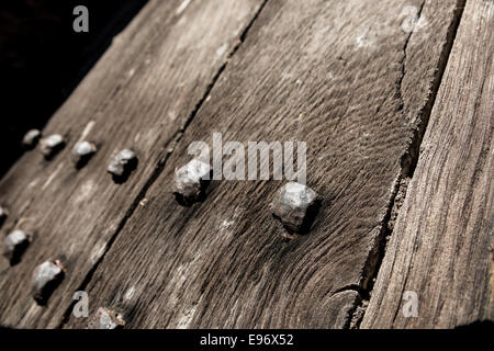 Detail of an old church studded oak door background. Stock Photo