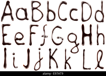 Big and small letters of the alphabet made from chocolate syrup are isolated on a white background Stock Photo